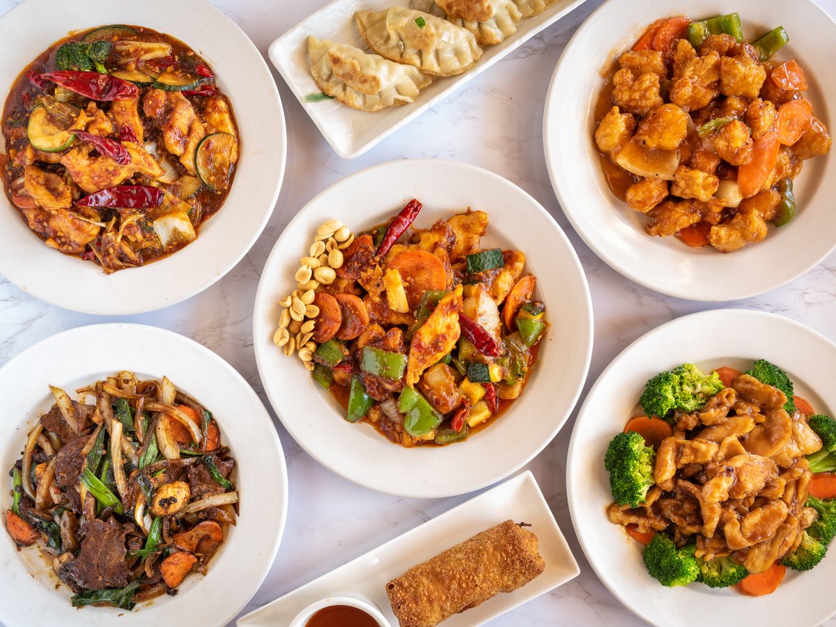 Family-style spread of dishes at Autumn Court, Phoenix