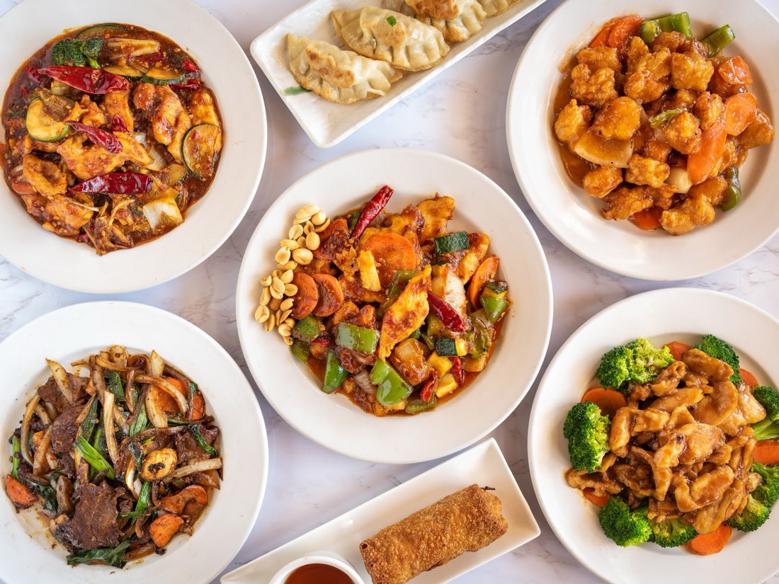 Family-style spread of Autumn Court dishes, feeds 5 to 7